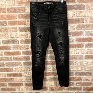 AEO Sz8 black very distressed hi rise jeggings.